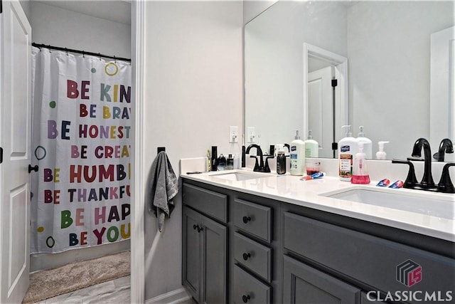 bathroom featuring vanity and walk in shower