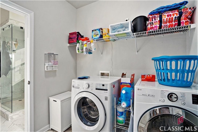 laundry room featuring washing machine and dryer