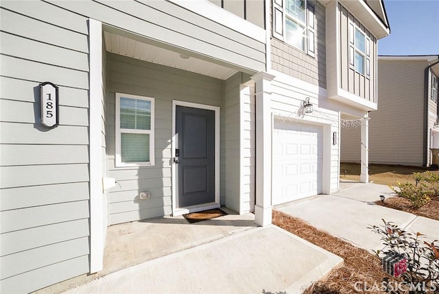 property entrance featuring a garage