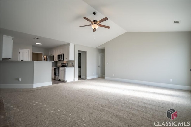 unfurnished living room featuring ceiling fan, light carpet, and lofted ceiling