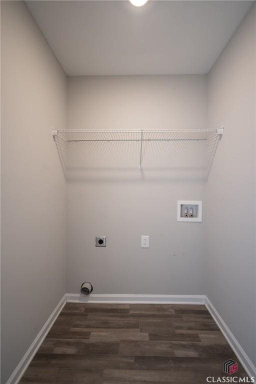 laundry room with hookup for an electric dryer, dark wood-type flooring, and washer hookup