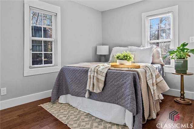 bedroom featuring dark hardwood / wood-style floors