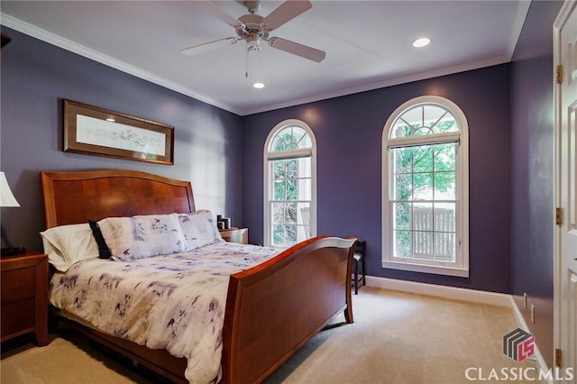 bedroom with ceiling fan, light colored carpet, and ornamental molding