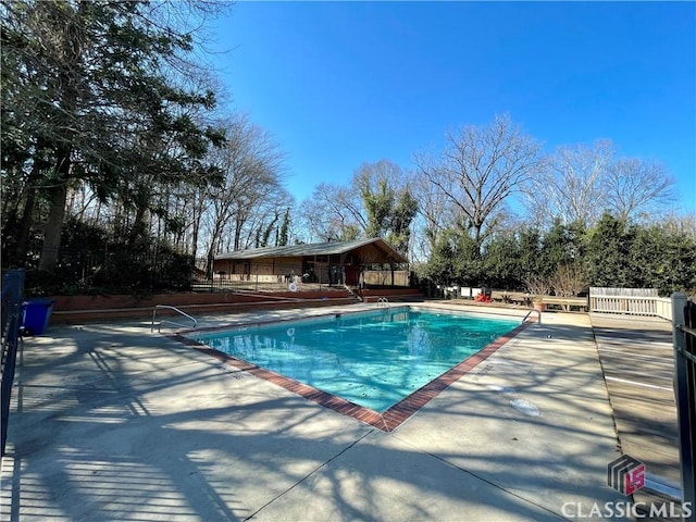 view of pool with a patio