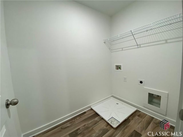 washroom featuring washer hookup, electric dryer hookup, and wood-type flooring