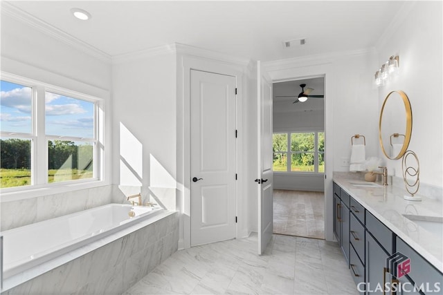 bathroom with vanity, ceiling fan, crown molding, and tiled tub