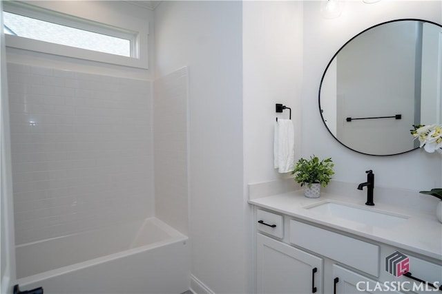 bathroom with vanity and  shower combination