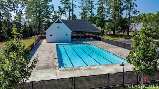 view of pool featuring a patio