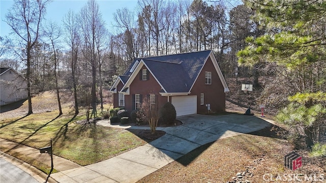 view of property exterior with a garage