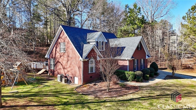 view of home's exterior featuring a yard and central air condition unit