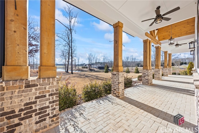 view of patio featuring ceiling fan