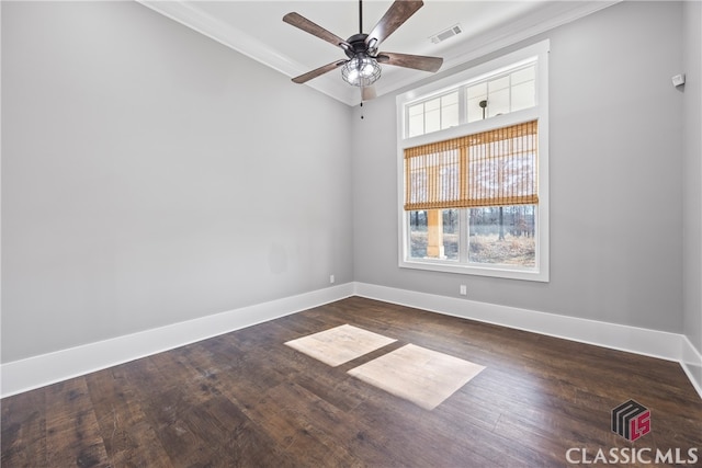 unfurnished room with ceiling fan, crown molding, and dark hardwood / wood-style floors