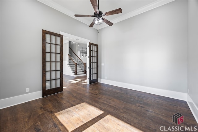 spare room featuring french doors, wood-type flooring, ceiling fan, and crown molding