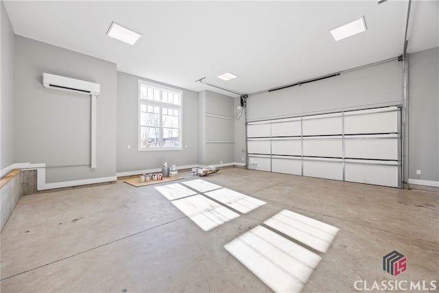 garage featuring a wall unit AC