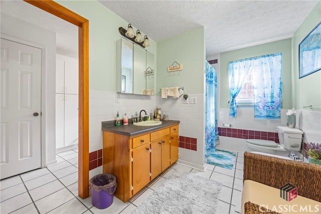 bathroom with tile walls and tile patterned floors