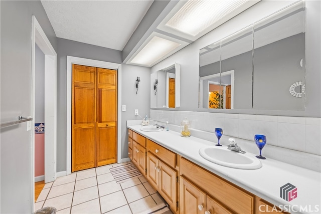 bathroom featuring vanity and tile patterned floors