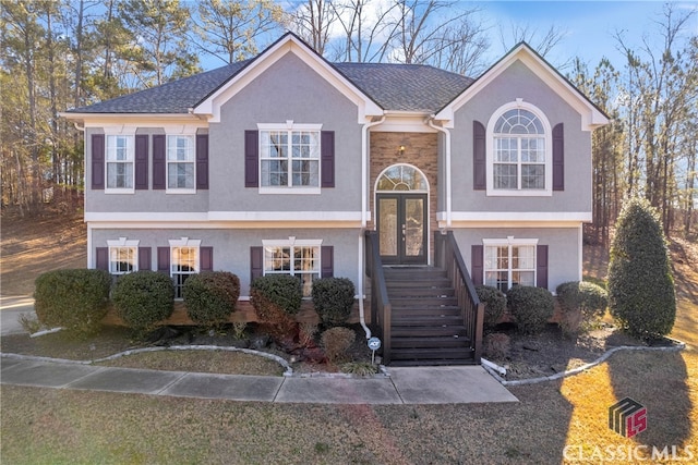 split foyer home with french doors