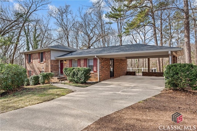 view of front of home featuring a carport