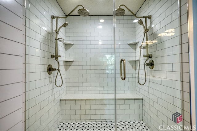 bathroom featuring an enclosed shower