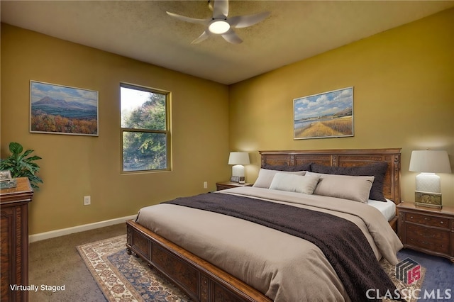 bedroom featuring ceiling fan and carpet flooring