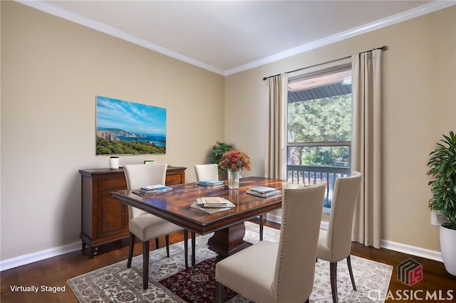 dining room featuring ornamental molding and dark hardwood / wood-style floors