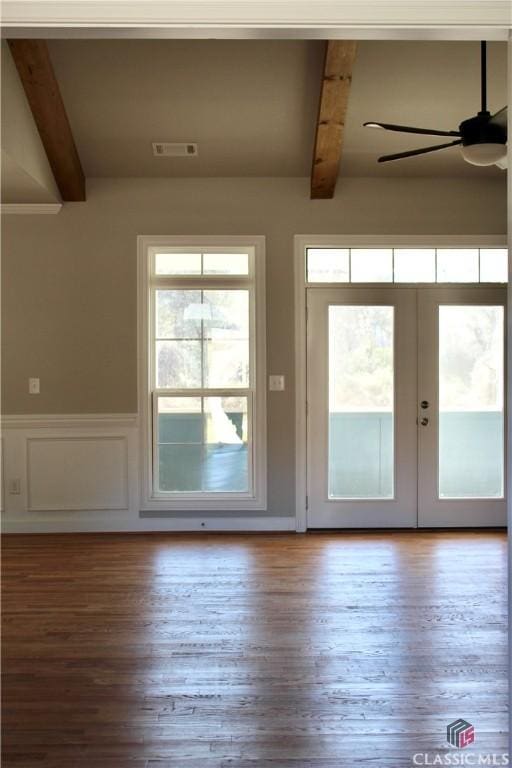 doorway with french doors, ceiling fan, hardwood / wood-style flooring, and beamed ceiling