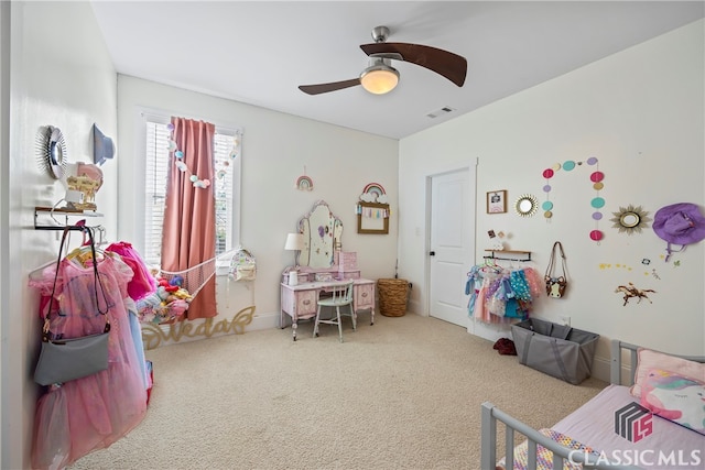 carpeted bedroom featuring ceiling fan