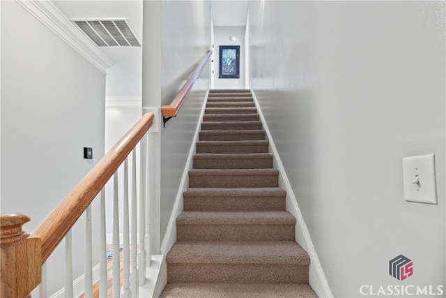 staircase with ornamental molding