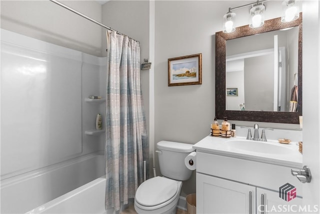 full bathroom featuring toilet, shower / bath combination with curtain, and vanity