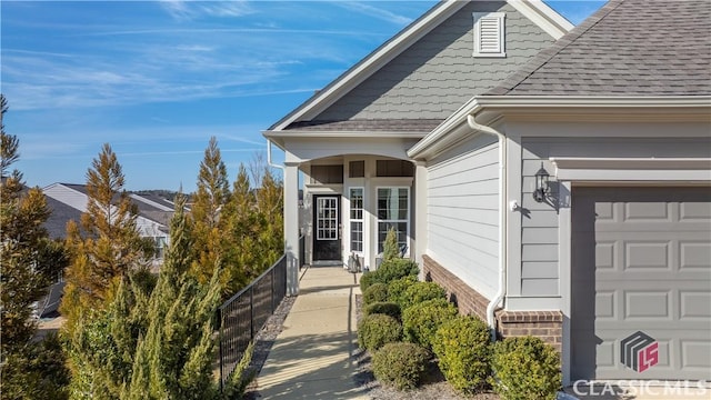 entrance to property featuring a garage