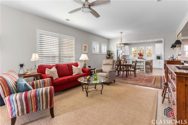 living room featuring ceiling fan