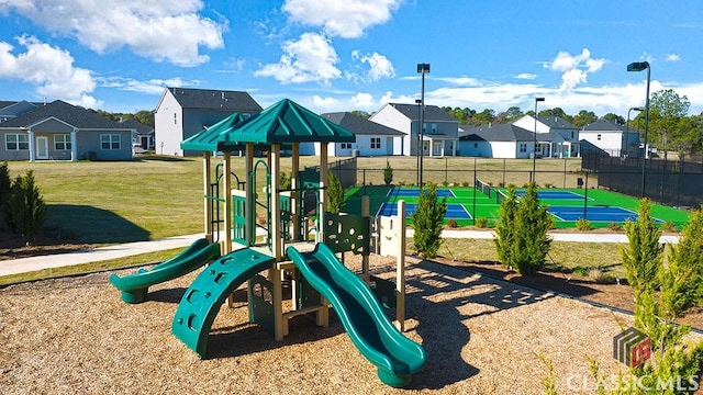 view of jungle gym with a yard