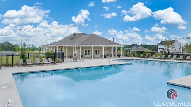 view of swimming pool featuring a patio area