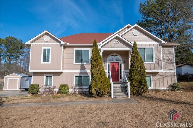 split foyer home with an outbuilding