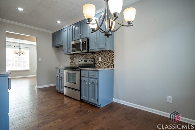 kitchen with appliances with stainless steel finishes, decorative backsplash, decorative light fixtures, a chandelier, and crown molding