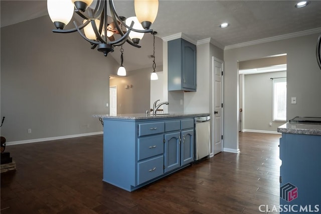 kitchen featuring decorative light fixtures, dishwasher, blue cabinets, a chandelier, and sink