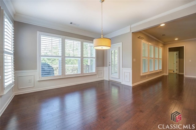 unfurnished room with dark hardwood / wood-style floors and ornamental molding