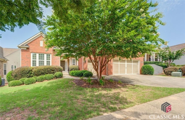 obstructed view of property featuring a front lawn, central AC unit, and a garage