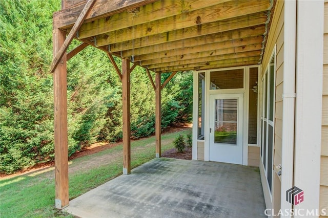 view of patio featuring a carport