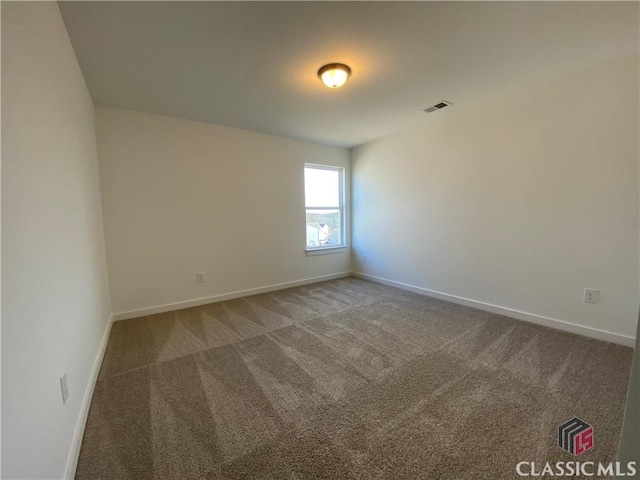 empty room with carpet floors