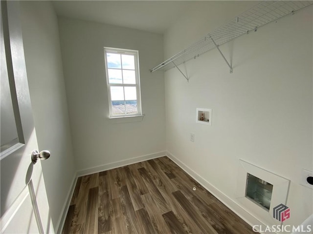 clothes washing area featuring dark wood-type flooring, washer hookup, and electric dryer hookup