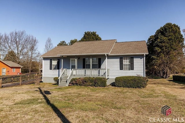 view of front of home featuring a front lawn and a porch