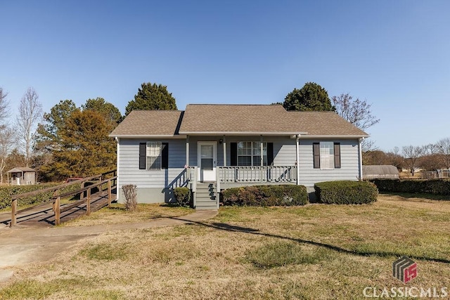 view of front of home featuring a front lawn and a porch