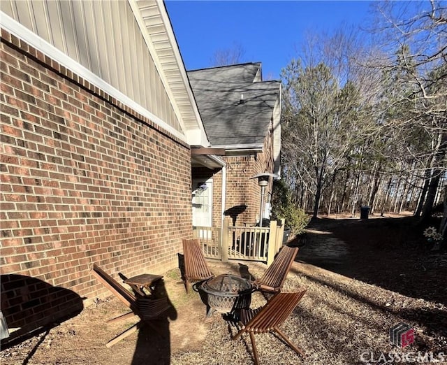 exterior space featuring a fire pit