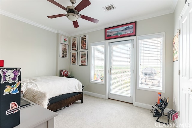 carpeted bedroom with ceiling fan, multiple windows, and crown molding