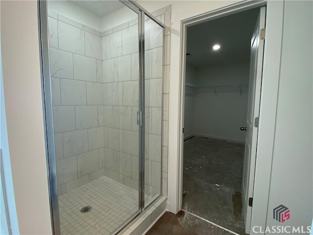 bathroom featuring an enclosed shower