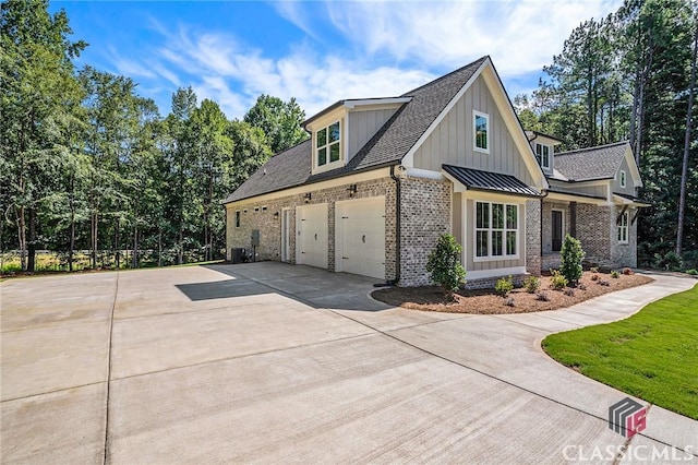 view of side of property featuring a garage