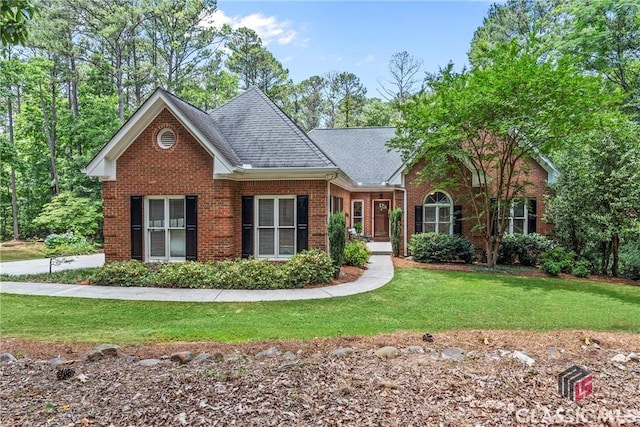 view of front of property with a front lawn