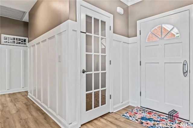 foyer with light wood-type flooring