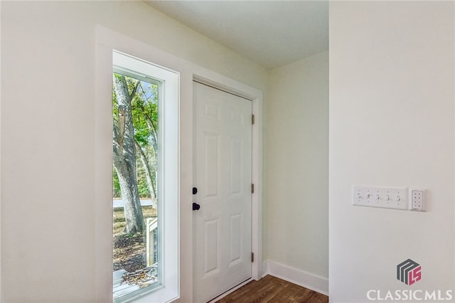 interior space with dark wood-type flooring